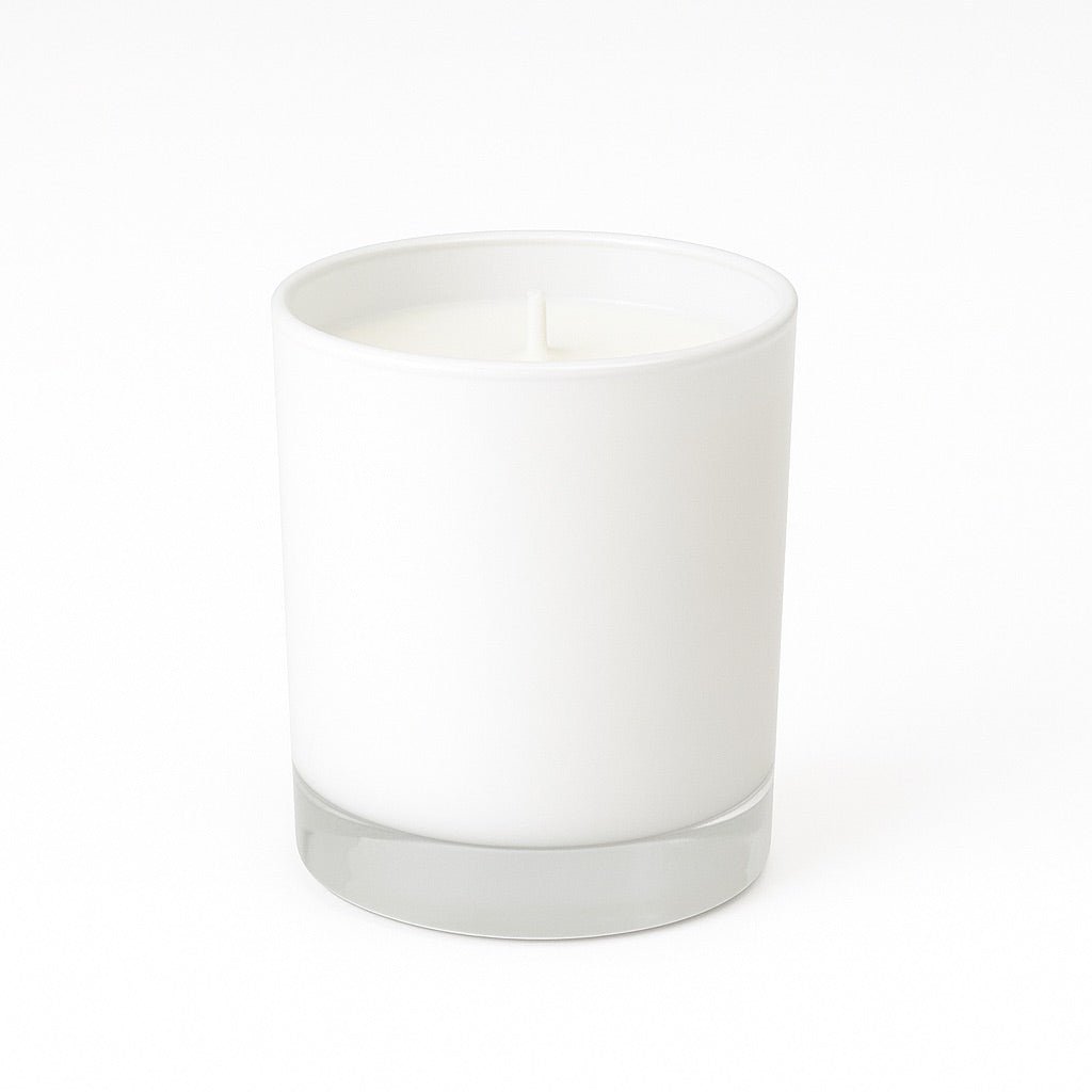 Chic 8 oz. self-trimming wick  candle in a compact vessel, delivering a warm, luxurious scent for elevated living.