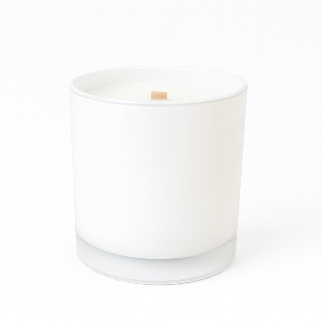 Elegant 12 oz wood wick candle in a slender vessel, delivering a warm, luxurious scent for elevated living.